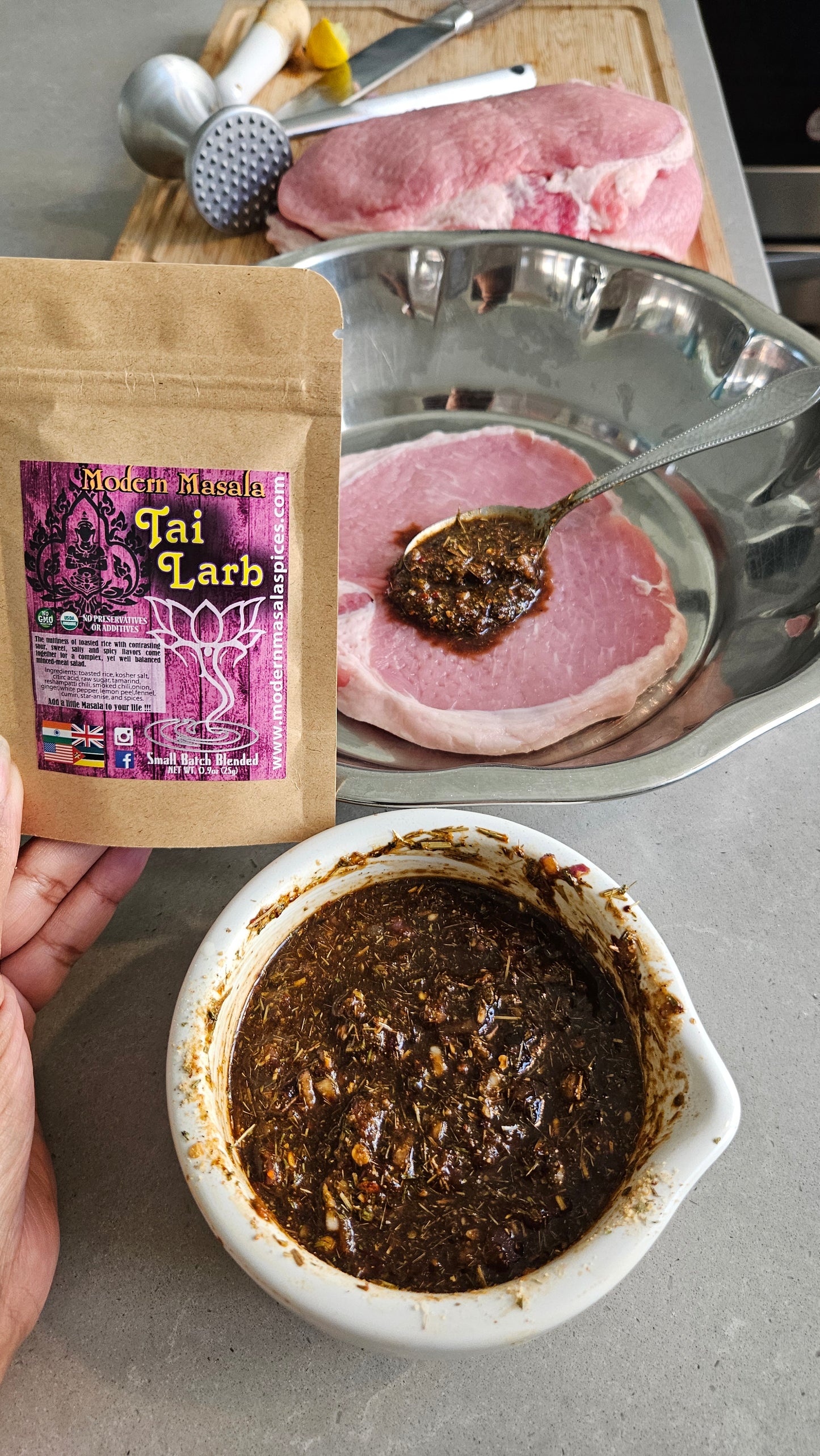 Preparation of meat with a spice mix on a cutting board, showing a brand label.