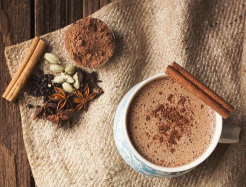 Chai Hot Cocoa in a mug image with whole spices