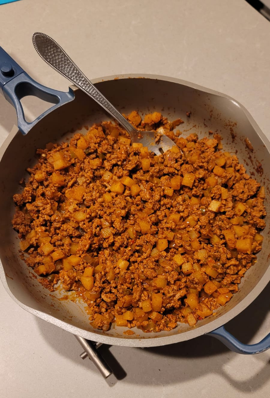 Picadillo ground meat and potatoes in a pan ready to eat 